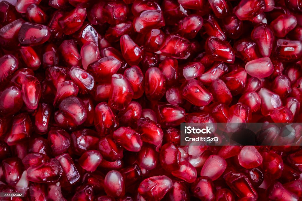 Full frame shot of fresh, red pomegranate seeds Pomegranate Stock Photo