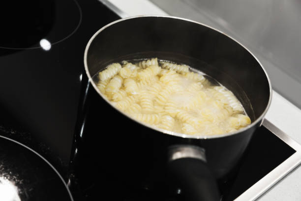 istock Boiling water with Fusilli pasta 873612902