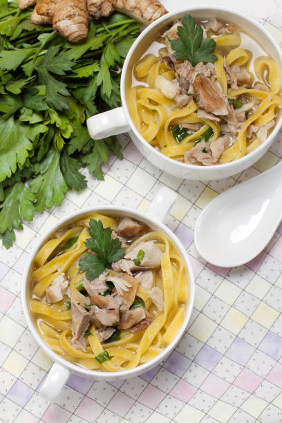 istock Chicken noodle soup with ginger and parsley 873616974