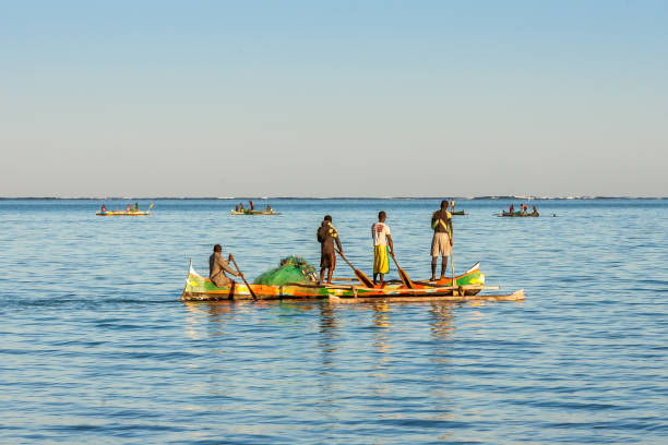 Fishing scene of Malagasy fishermen Tsifota, Madagascar, June 08, 2017: Fishing scene of Malagasy fishermen of the Vezo ethnic group in the Ambatomilo lagoon in southwestern Madagascar mozambique channel stock pictures, royalty-free photos & images