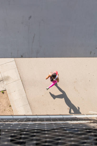 istock top view of a fit woman runner 873623218