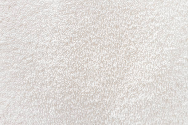 macro ravvicinata di panno per asciugamani bianchi - cotton white textured toiletries foto e immagini stock