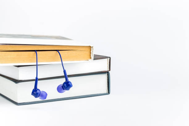 istock Books and headphones on white bacground. 873631846