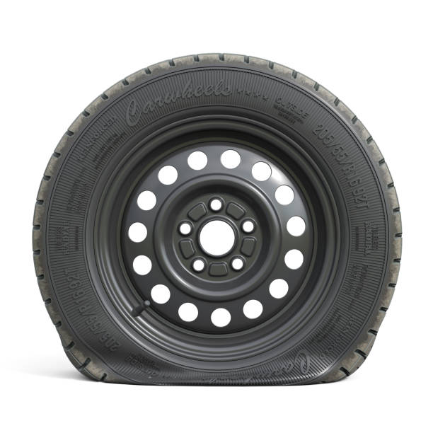 Punctured black car wheel isolated on white background. Punctured black car wheel isolated on white background. 3d render illustration flat tire stock pictures, royalty-free photos & images