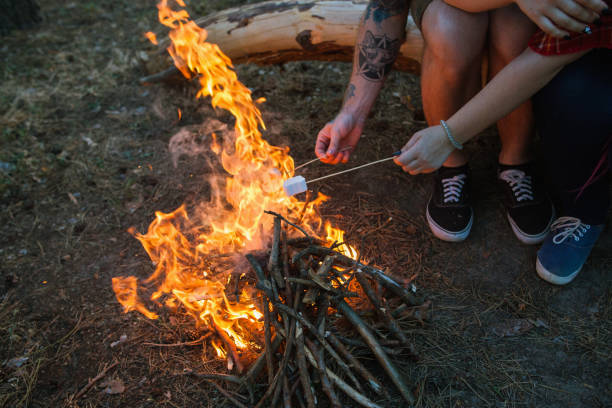 istock Picnic couple tourism bonfire concept. 873636136