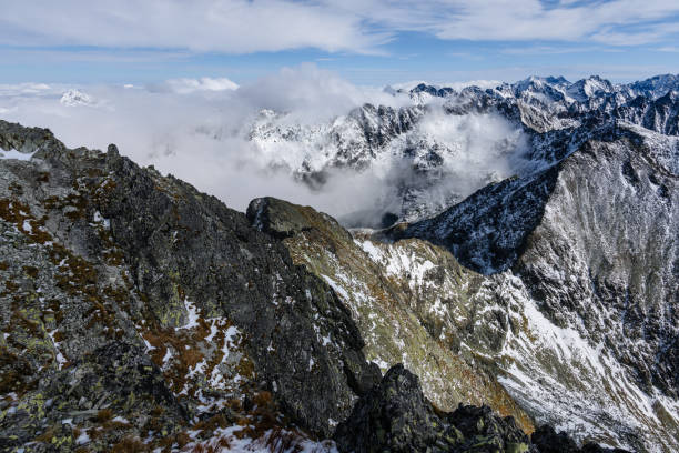 istock mountain tops in winter covered in snow 873639018