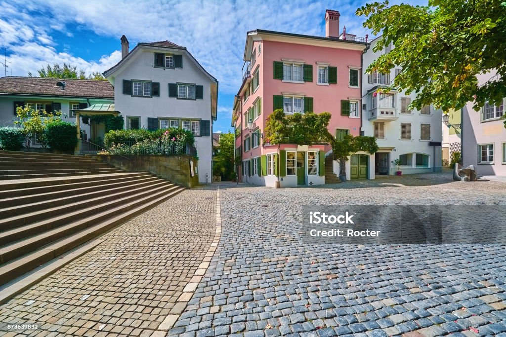 Square in Zurich Square Opposite the Church of St. Peter in Zurich, Switzerland Zurich Stock Photo