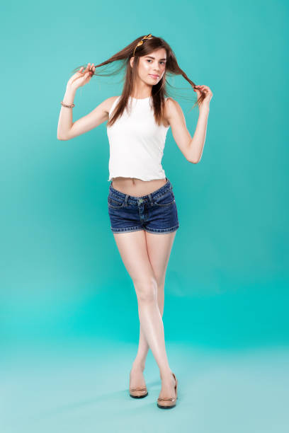 istock beautiful woman on a blue background 873640482