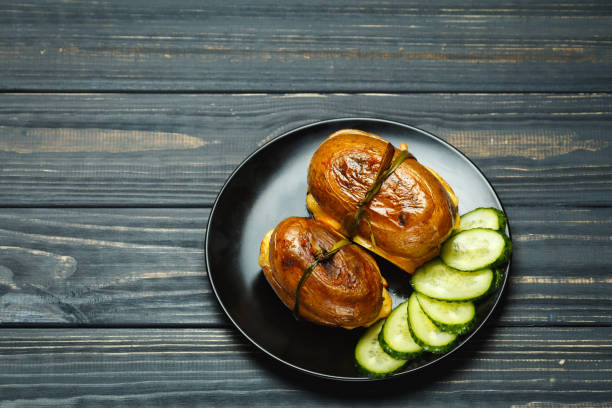 istock Delicious roast potatoes with garlic and cucumber 873642724