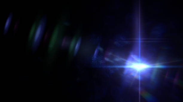 istock intense blue lens flare overlay texture with bokeh effects and light streak on black background 873642750