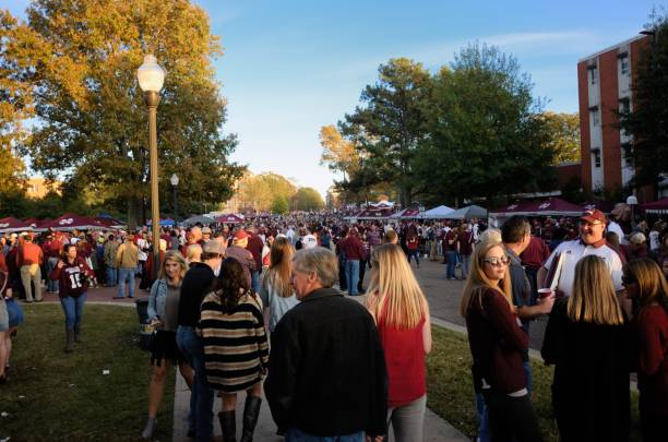 Tailgating on campus Mississippi State, Mississippi, USA - November 11, 2017: Fans tailgating just prior to the Mississippi State University versus The University of Alabama football game on the campus of Mississippi State University. mississippi state university stock pictures, royalty-free photos & images