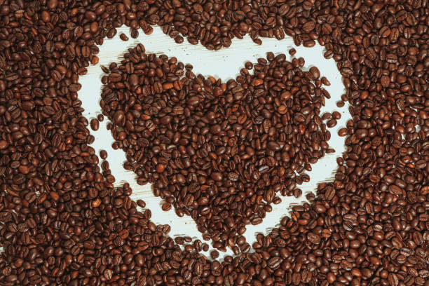 istock heart coffee on white background and cup coffee 873646960