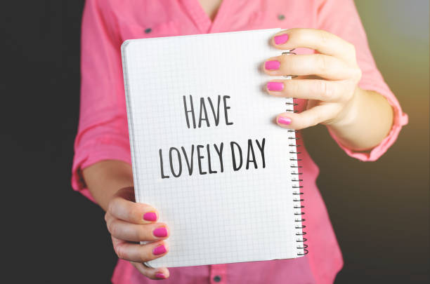 istock Young woman in pink shirt working 873647094