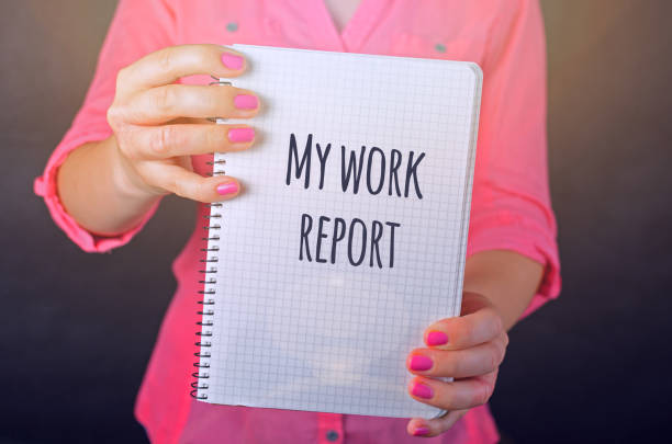 istock Young woman in pink shirt working 873649548