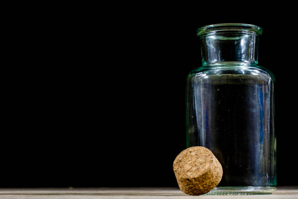 cork in the wine bottle and blurry background, photographed from above for winemaker business card or book cover