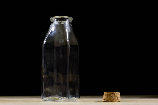 cork in the wine bottle and blurry background, photographed from above for winemaker business card or book cover