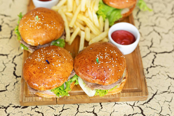 istock burgers with bacon, lettuce and sesame seeds 873650800