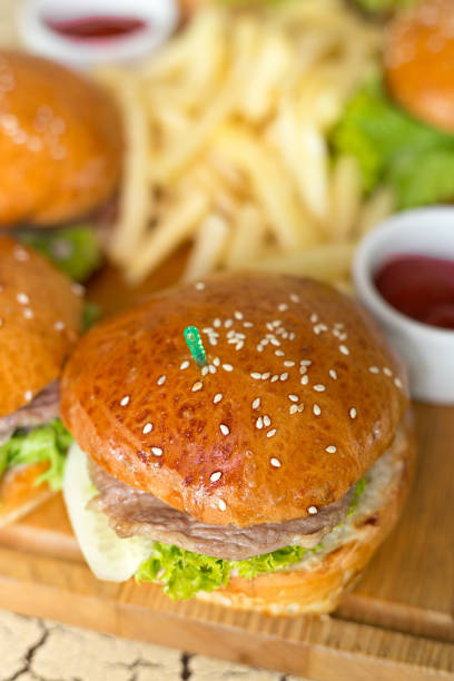 istock burgers with bacon, lettuce and sesame seeds 873650826