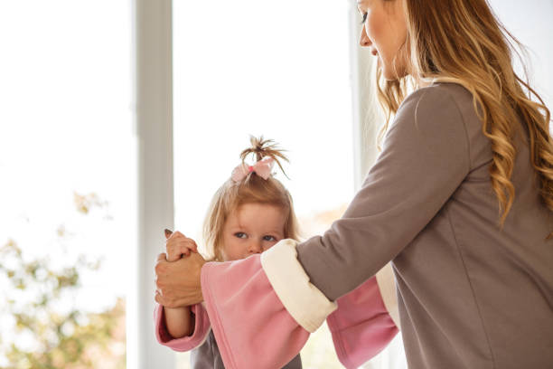 istock Mom and baby playing indoors 873654574