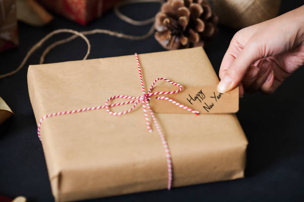 istock Wrapping New Year gifts 873657546
