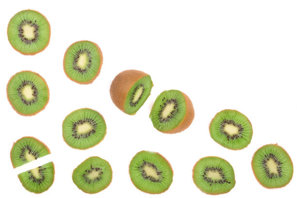 istock sliced kiwi fruit isolated on white background, with copy space for your text. Top view 873658138