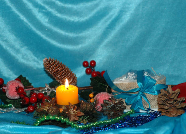 istock Christmas background. Pine branches,toys, candle on a blue background 873663006