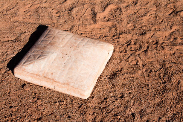 istock First base in the dirt on a baseball diamond 873663202