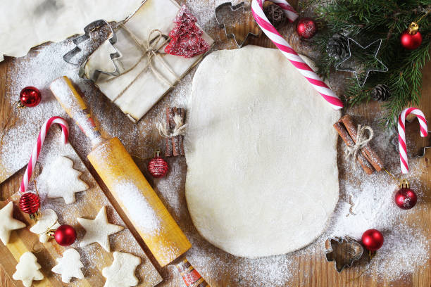 istock Cooking butter biscuits of different shapes on a wooden table 873666604