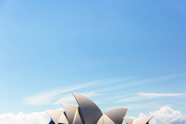 Sydney, Australia - November 11, 2017: Roofline 'The sails' of Sydney's Opera House against blue sky in Sydney Australia. Sydney's Opera House is a UNESCO World Heritage site