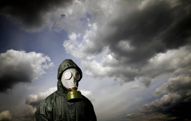 istock Gas mask and dramatic sky. Survival concept. 873669824