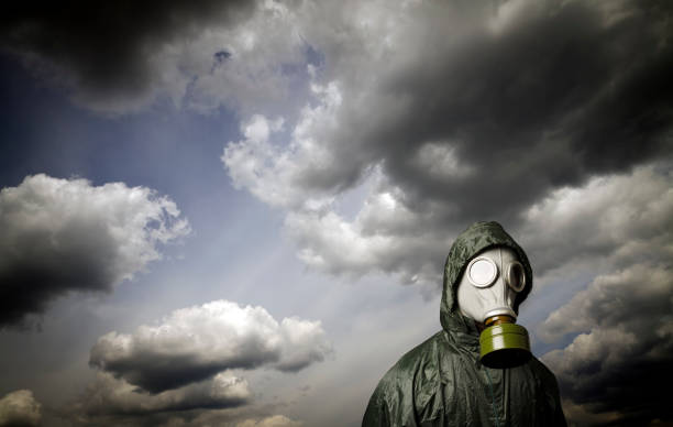 istock Gas mask and dramatic sky. Survival concept. 873669826