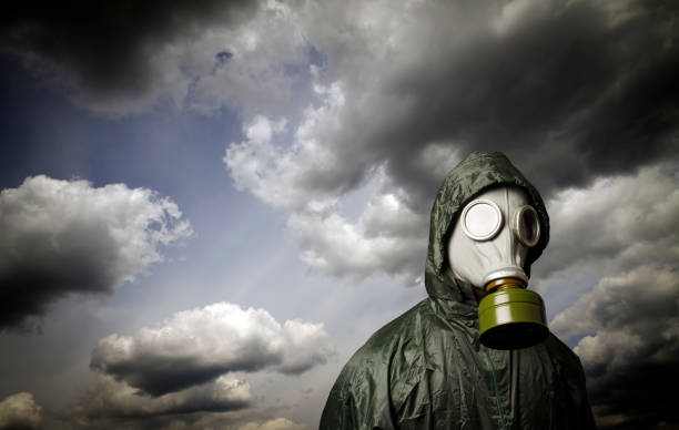 istock Gas mask and dramatic sky. Survival concept. 873669832