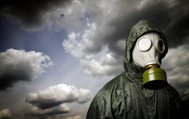 istock Gas mask and dramatic sky. Survival concept. 873669834