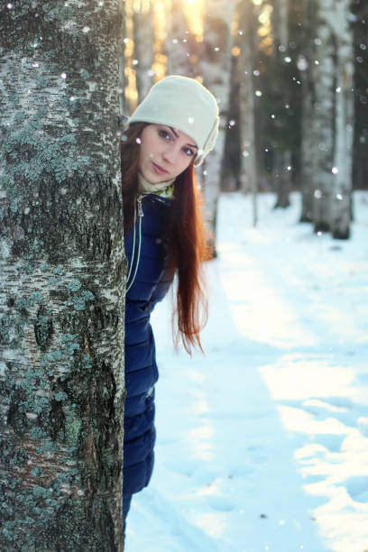 istock snow winter portrait female 873670394