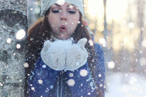 woman walk in a park winter snow outdoor