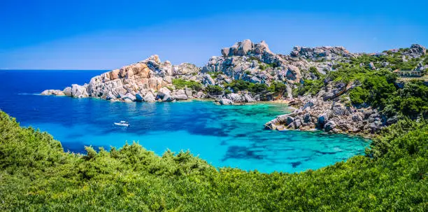 Photo of Bizarre granite rock and azure bay in Capo Testa, Sardinia, Italy