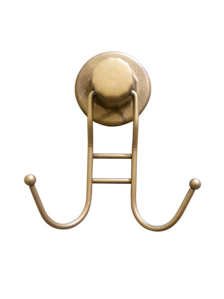 Brass Coat hanger on wall Brass Hangers on wall coat hook photos stock pictures, royalty-free photos & images