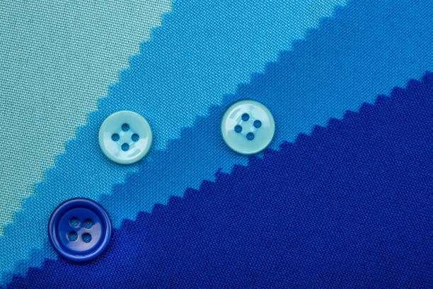 istock blue button and samples of fabric texture detail 873673688