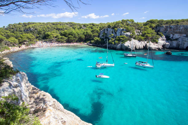 istock Boats and yachts on Macarella beach, Menorca, Spain 873684560