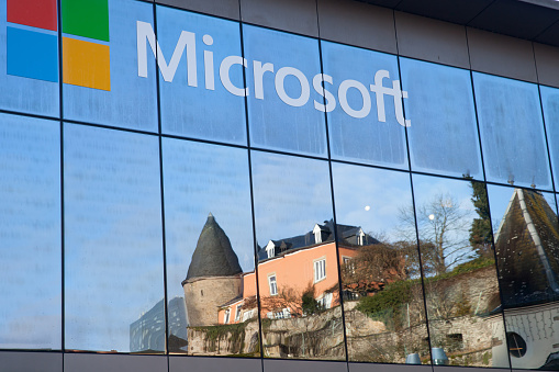 Luxembourg: A reflection of mediaeval castle in windows of Microsoft's office