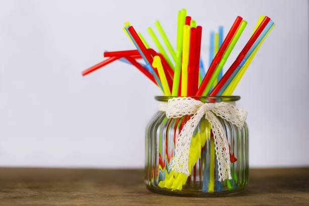 istock colored plastic cocktail tubes standing in a glass 873688320