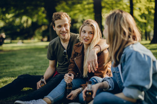 istock Friends enjoying outdoors with the beer 873697374