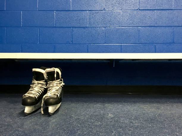 istock Hockey skates in changing room 873699438