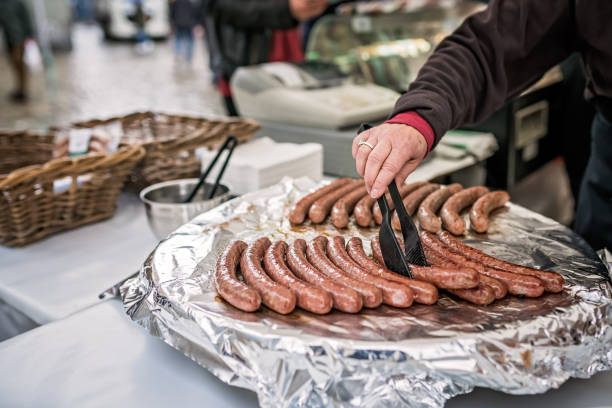 istock Grilling sausages for hot dogs 873701710