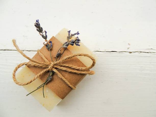 istock Handmade spa bath soap on vintage wooden background. 873702138