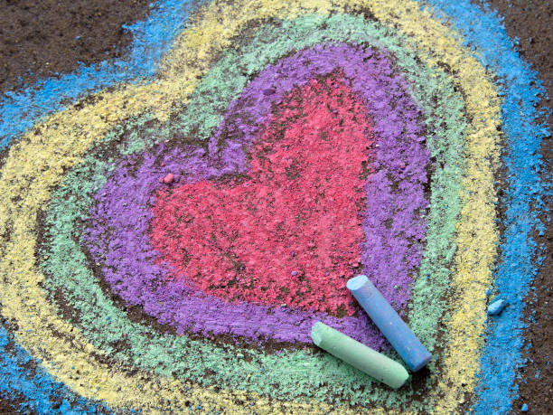 istock chalk drawing: colorful hearts on asphalt 873705178
