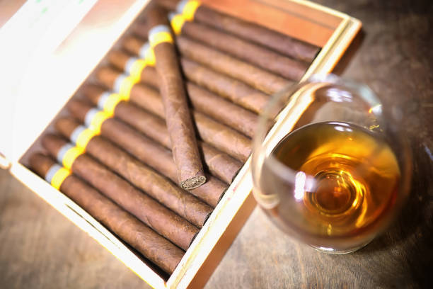 istock Large box of Cuban cigars on a wooden table 873718296