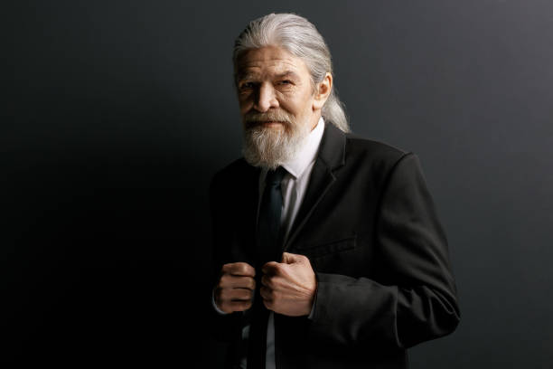 istock Stylish old man in black jacket 873722616