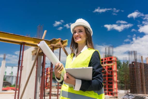 istock Portrait of a confident female architect or engineer with can-do attitude on the construction site 873743244