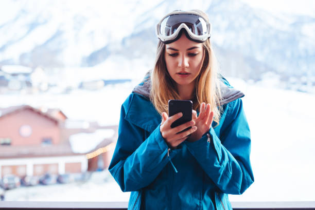 istock young  snowboarder woman 873746380